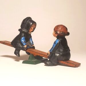 Vintage Cast Iron Figurine Amish Children on Seesaw Early 20th Century Americana